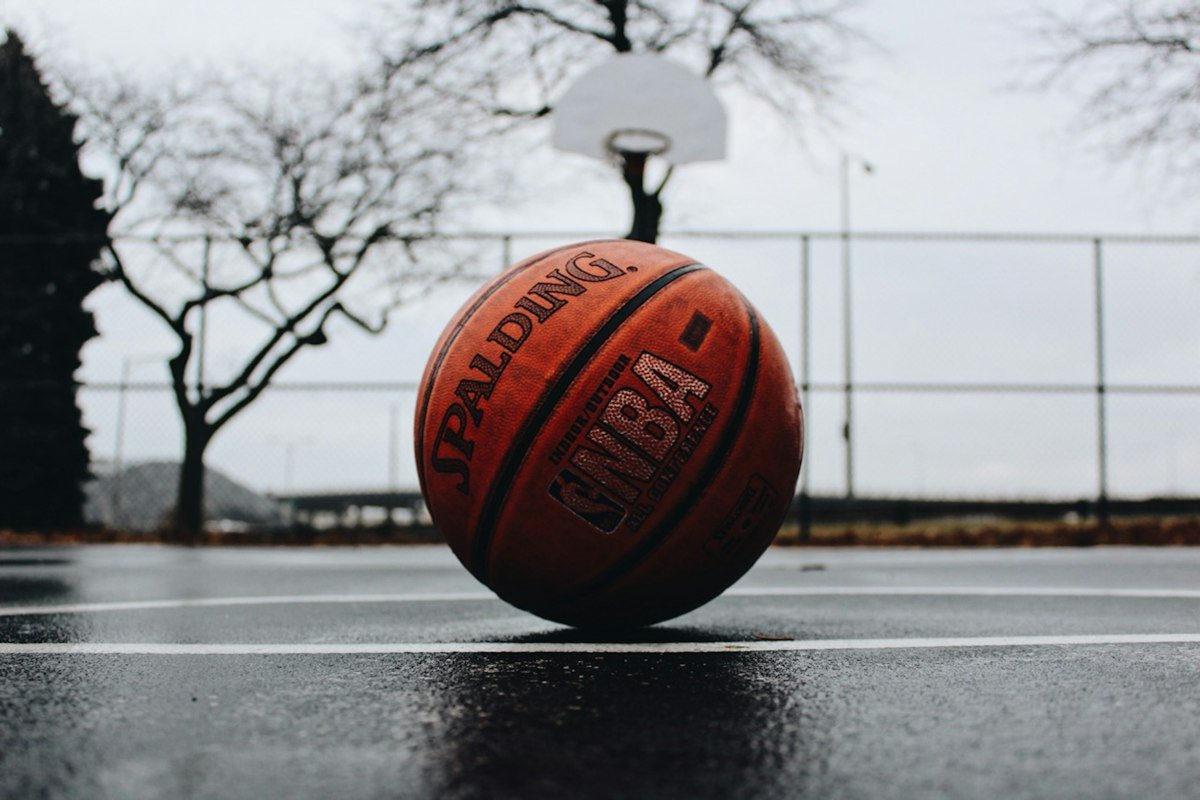 Basketball in Kosovo: Basketball swishing through the net during clutch final seconds of playoff game